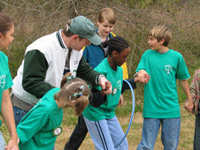camp volunteer with kids