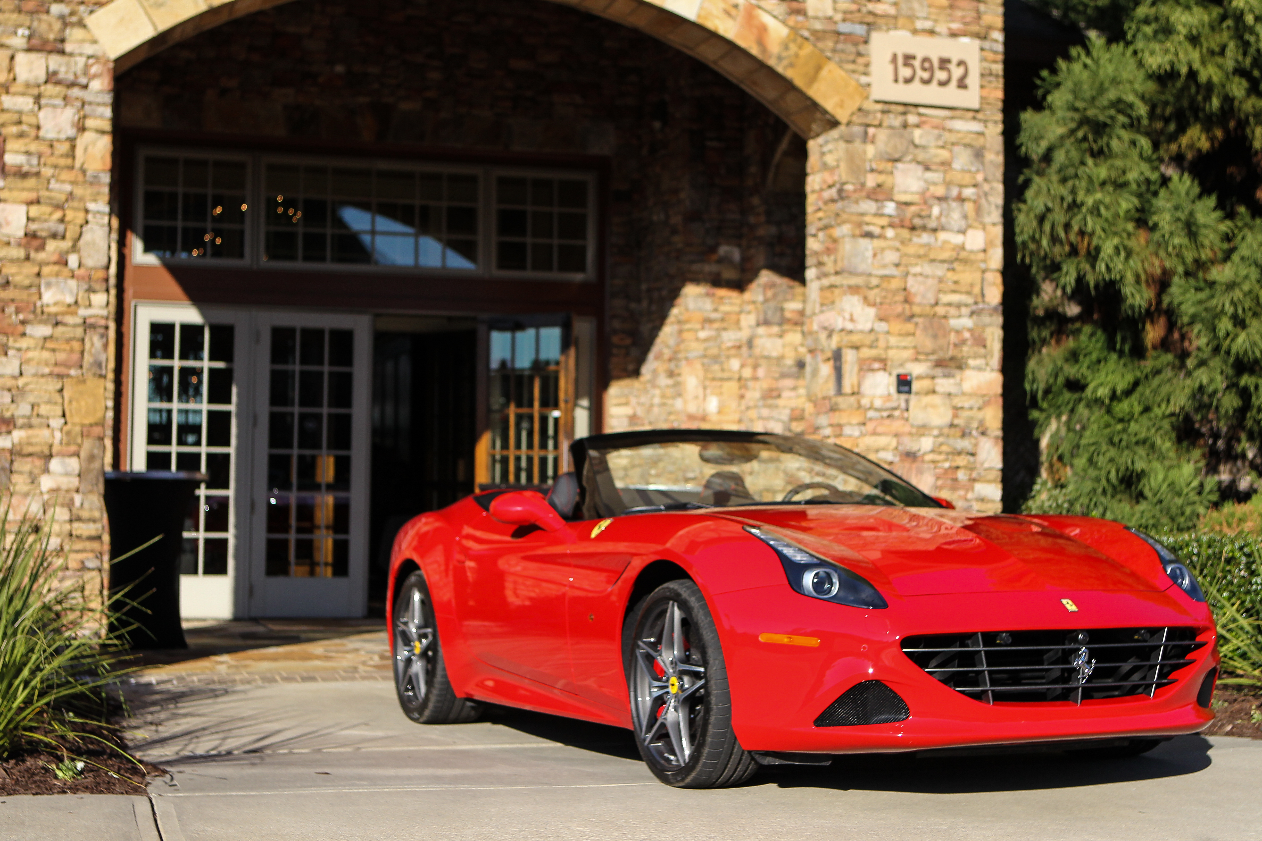 red Ferrari at Hit "Em for Hemophilia Golf Tournament