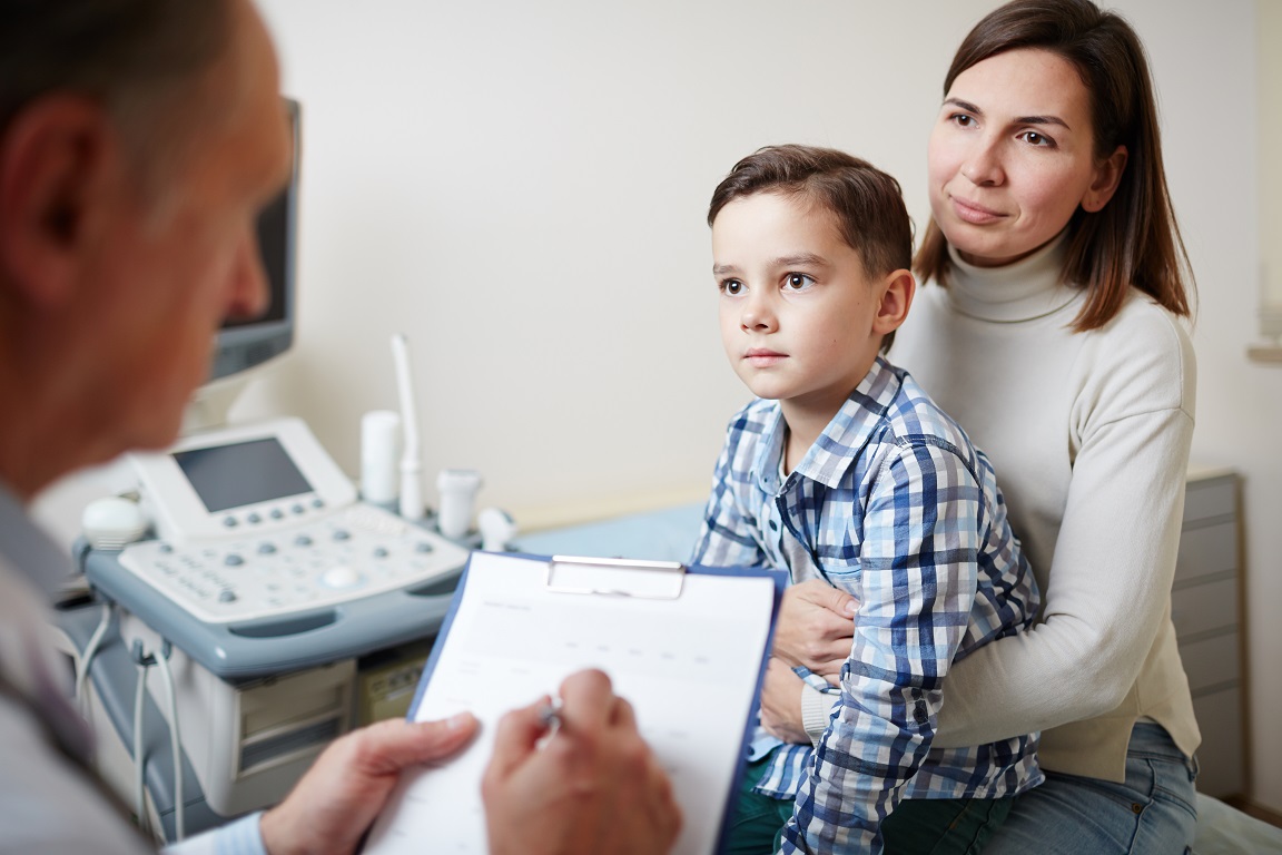 Mother and her son at a doctor visit