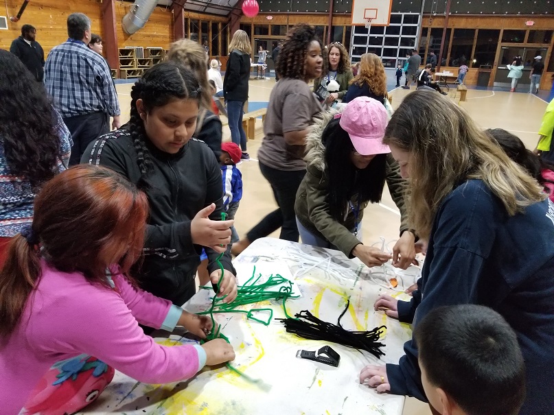 people at a workshop at family camp