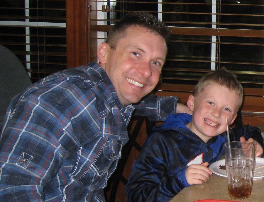 father and son at restaurant