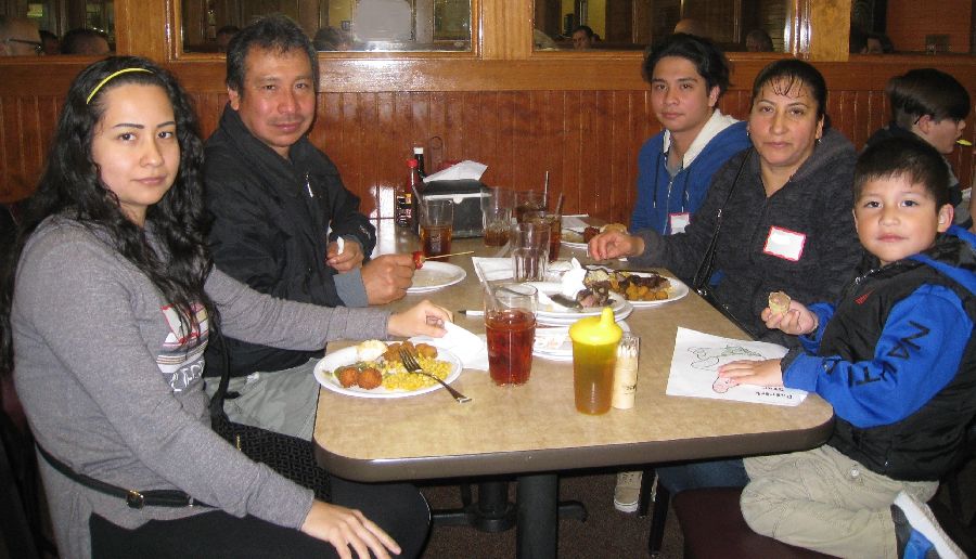 five people at a table