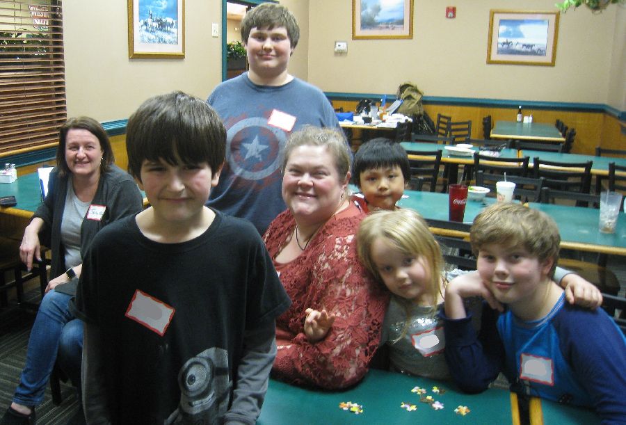 seven people at a restaurant