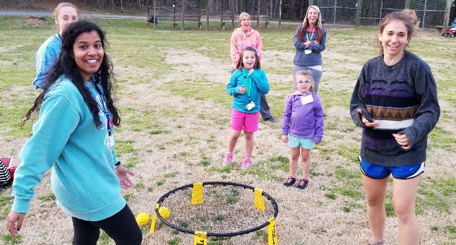 kids playing by net