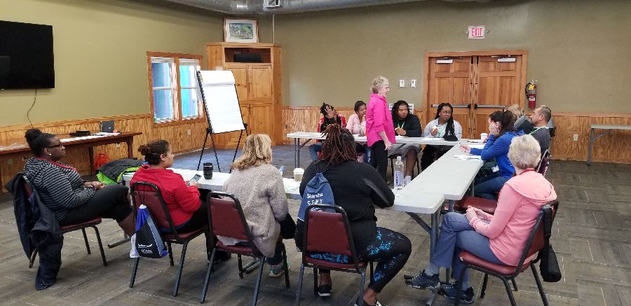 woman presenting to group