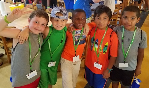 5 kids posing at camp wannklot lunch