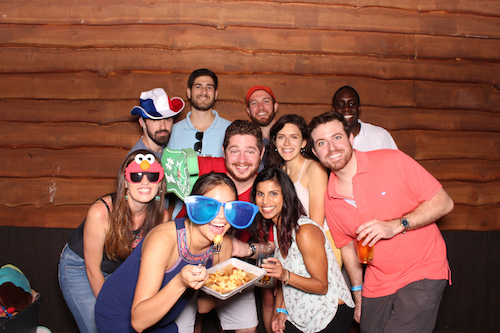 group at brewery with photo props