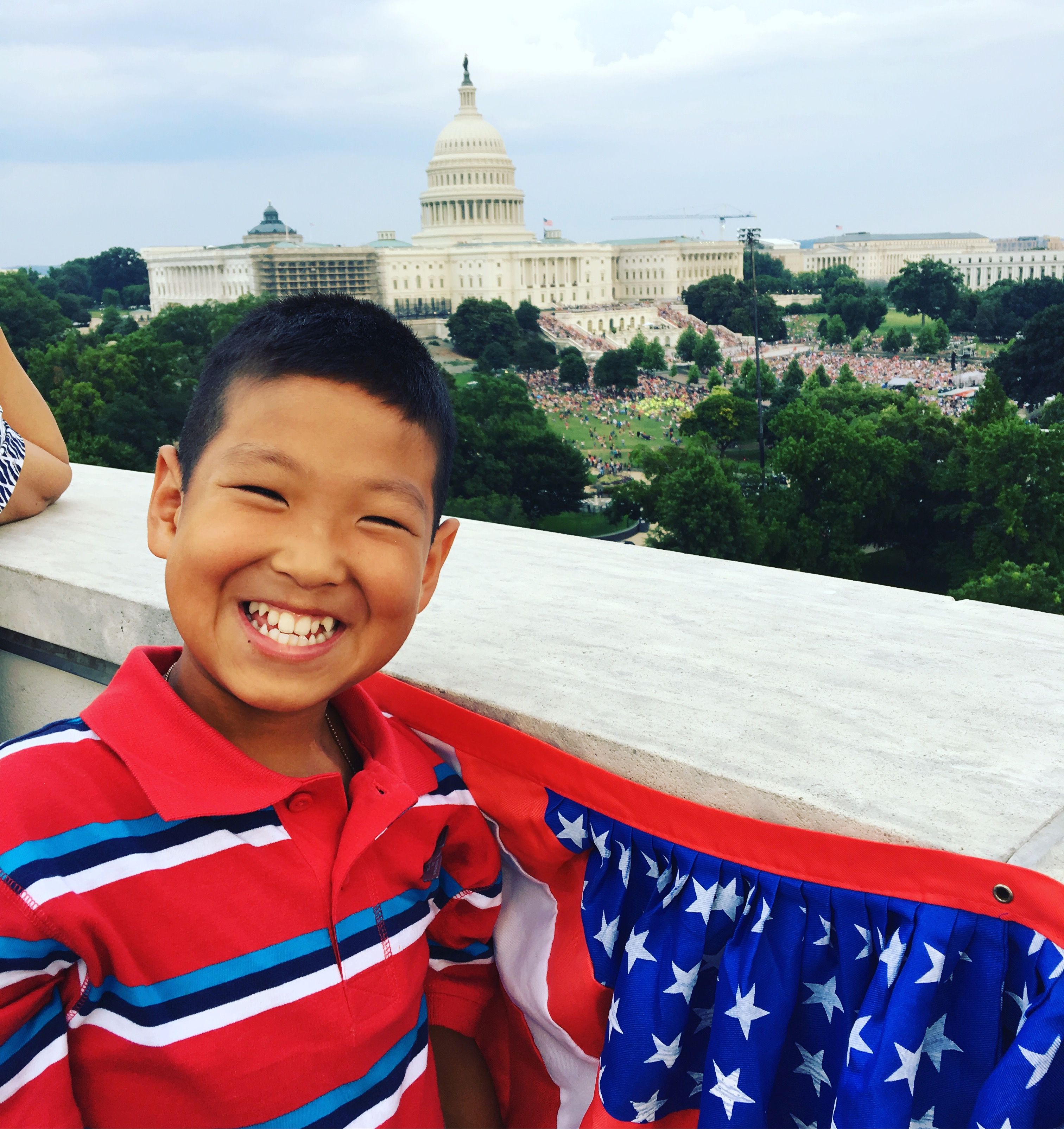 boy with capitol in background