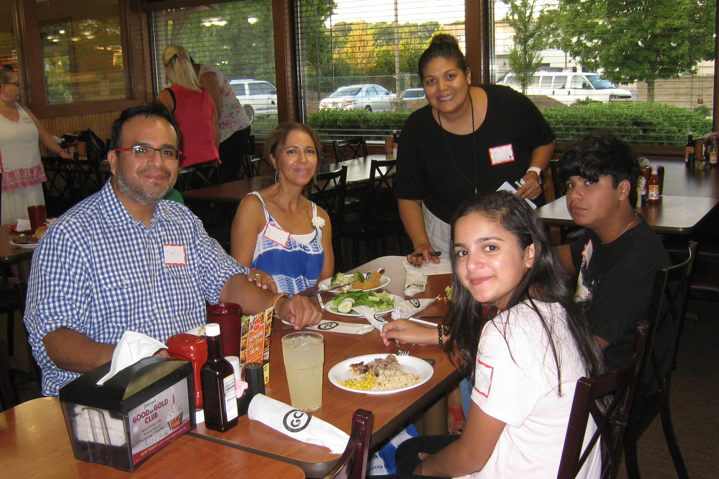 Spanish Speaking Family at Community Dinner in Lawrenceville