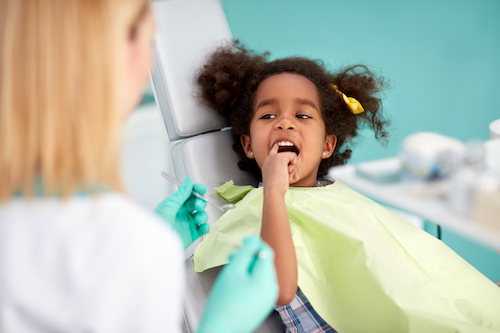 kid getting a dental exam