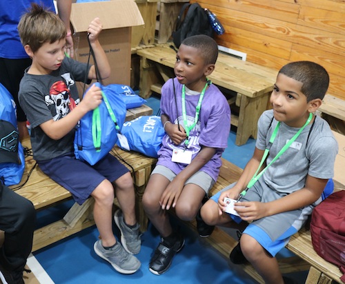 3 boys crafting at camp wannaklot