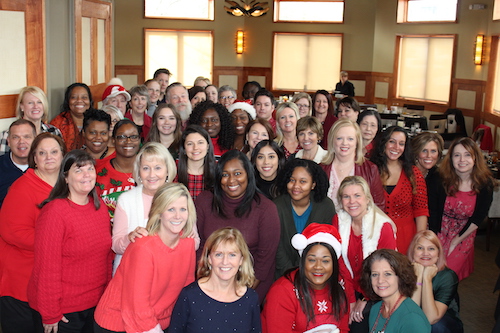 HoG Staff Holiday Photo, staff is wearing red sweaters