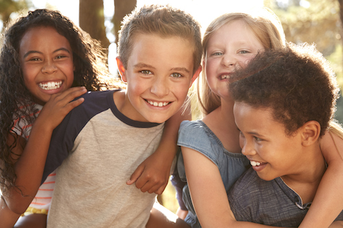 group of kids hugging