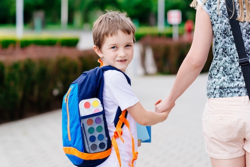 kid wearing backpack